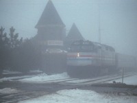 Everyone is out enjoying the beautiful weather these days; and for some asinine reason I thought this might be a good time to offer up an image taken in just about the lousiest weather imaginable. So here is Amtrak 348, eastbound on the Grimsby Sub as train #97, stopped at the old CN station at Ontario St in Grimsby. Damp, cold and downright miserable. Some days I wondered why I bothered.........