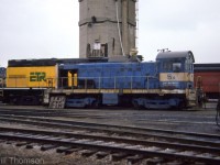 Two Allied Chemical Alco S4 switchers are shown at the Essex Terminal Railway's shops in Windsor in April 1987, by ETR's own <ahref=http://www.railpictures.ca/?attachment_id=30545><b>C420 106</b></a>. Shown are: Allied Chemical 5A (nee B&O 9001) and 3A (nee B&O 9113).
<br><br>
Rosters list these formerly at Allied's Solvay NY plant, and stored on the ETR in 1987/1988 before being put into service at Allied's plant in Amherstburg, Ontario (that became General Chemicals). 3A would be kept for parts, while 5A would become B12 and put into service.