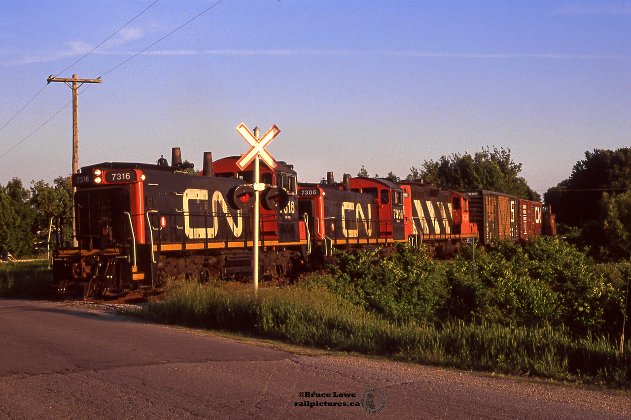 A CN local returns North to Guelph after working on the southern portion of the Fergus Sub in Cambridge.