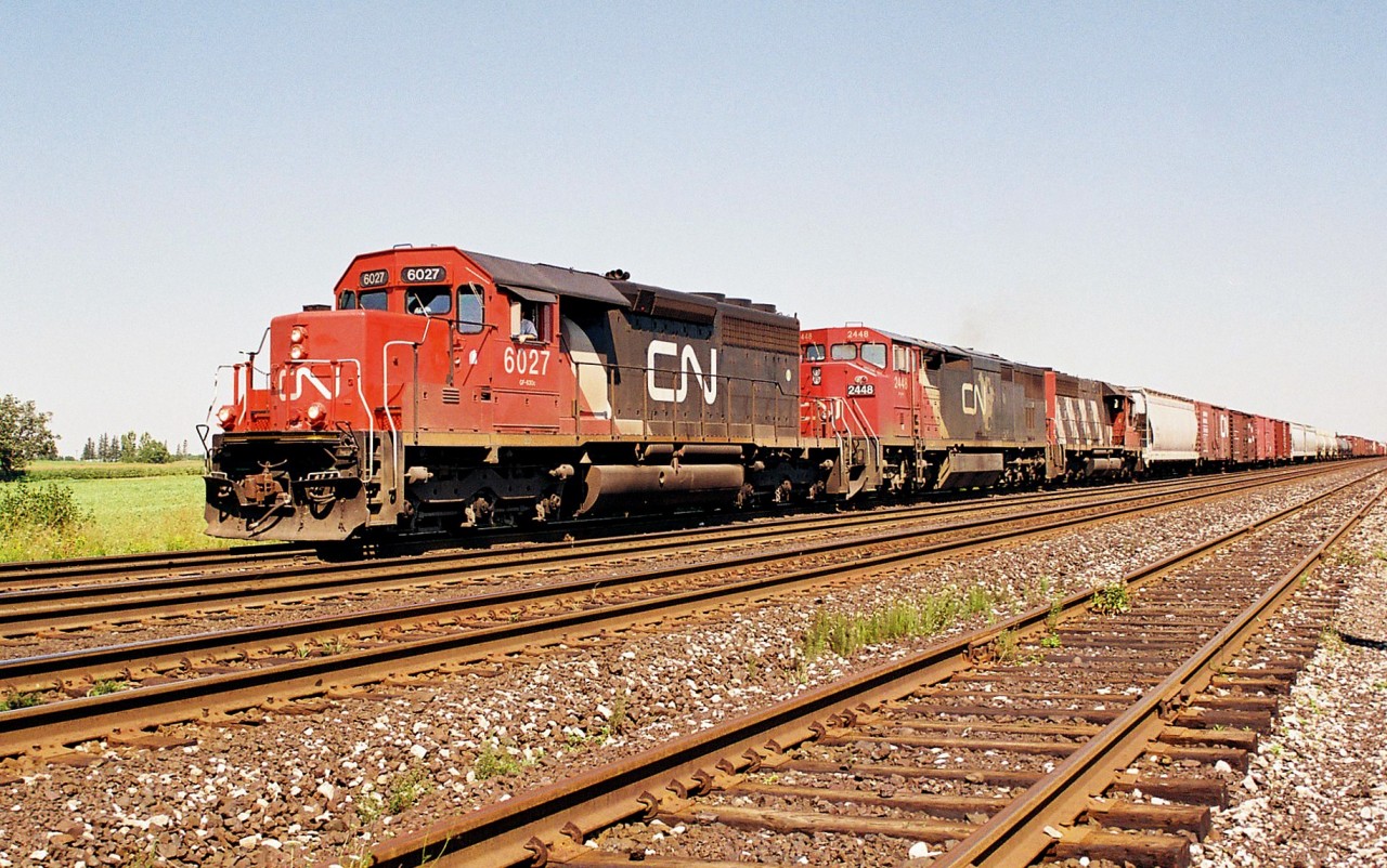 CN train 391 waits to depart Paris West on the CN Dundas Subdivision after completing it's work. The consist included; 6027, 2448 and 5204.
