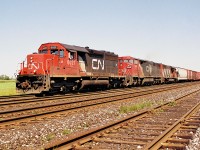 CN train 391 waits to depart Paris West on the CN Dundas Subdivision after completing it's work. The consist included; 6027, 2448 and 5204. 