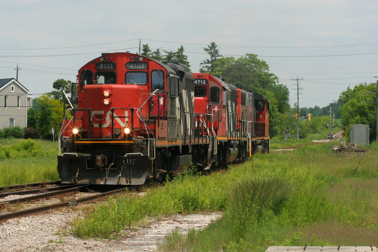 CN L568 with 4131, 4713 and 4784 is light power as it rolls through Baden towards Stratford on the Guelph Subdivision.