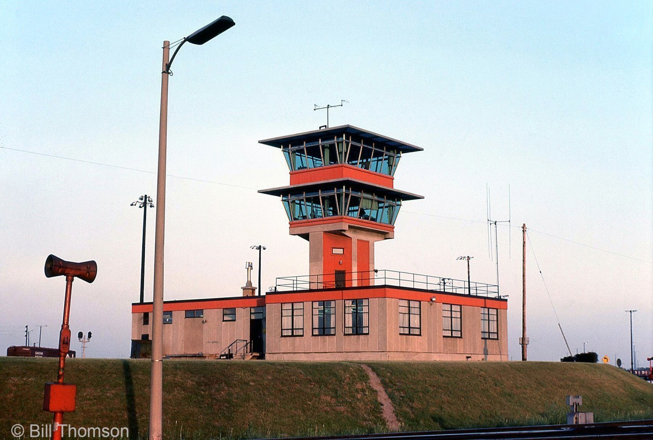 The main hump yard tower at the north end of CN's MacMillan Yard is shows in June of 1976. Originally opened in May 1965 as "Toronto Yard" (its location was just north of Toronto in the Concord/Maple area of Vaughan), it was CN's move to relocate their aging freight yards and facilities out of Toronto proper, to a new larger and more modern site located on former farmlands to the north. CN Toronto Yard was renamed "MacMillan Yard" in 1975.