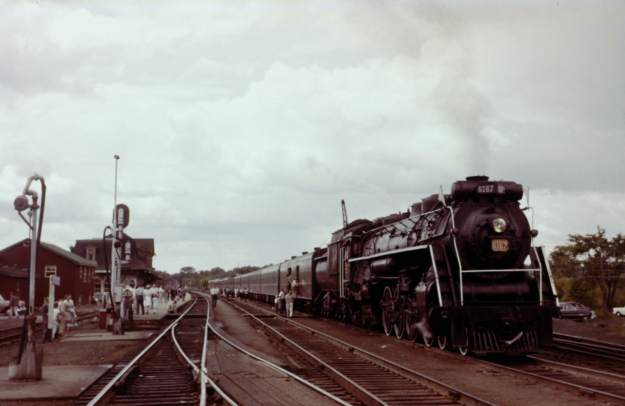 Unfortunately, I can't read the date on this slide from my pre-Kodachrome days...But, given the all "black and green" consist, this might be the July 9, 1961 Toronto-Belleville-Lindsay UCRS excursion behind Northern (4-8-4) 6167. A "classic Belleville" scene, prior to modernization and CTC signals. Those were the days--by itself, the UCRS sponsored four excursions that year including one the previous day Toronto-Oshawa with a tour of the Oshawa Railway!