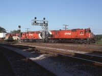 It seems that without fail the ol' "Starlite" impressed us fans. You just never knew what you would see for power, and whatever it was, it was interesting.
Some beautiful late afternoon lighting on this delightful Wednesday evening as the train rolled thru destined for Hamilton's Aberdeen Yard on the short run from Toronto. Power is CP 4564, 5545 and TH&B 74. The big M-630 on the lead would be retired in the early 90s, come back for a final hurrah, and be retired for good by 1995.