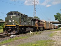 CP 6644 along with Heritage unit 7016 lead train 141 westbound through Windsor. 