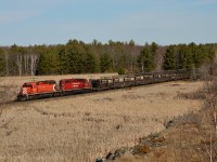 CP 5973 South with CWR-06 passing through North Parry, a former siding on CN's Bala sub torn up a few years ago despite being one of the more frequently used sidings in the DRZ between Parry Sound and Sudbury. North Parry also had the last active "Spring Switch" in Ontario, which was located a couple thousand feet North of here beyond the right side of frame. 