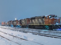 After the recent hot spell Southern Ontario endured I looked back on this image and remembered the bone chilling November night that it was.  Our region was hit with a nasty blast of lake effect snow for the afternoon and evening hours on November 15, 2018.  I recall my drive home from Woodstock taking 2.5 hours due to accidents and the 403 being closed.  While all that was going on, the power for L581 was resting patiently in the yard for the crew to come on duty.