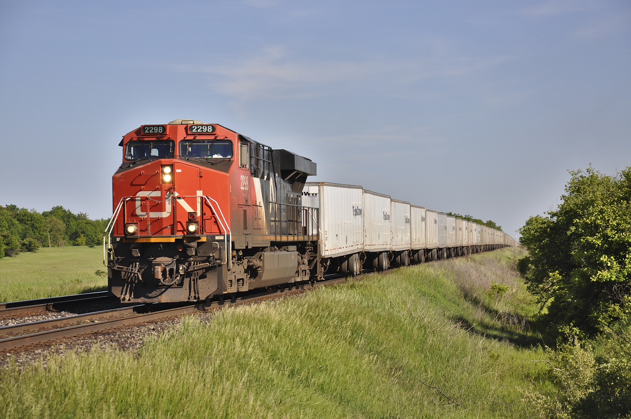 CN 2298 leads what I believe is 144 on the daily RoadRailer train. Although something as bland as trailers, it is nice seeing an entire unit train of a uniformed car.