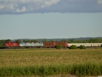 CP 421 has stretched ahead to clear North Yard Switch Spence and start what would turn out to be over 3 hours of work setting off/lifting. Trailing today are 2 CMQ former CP/now CP owned again SD40-2F's, these "Blue Barns" would make it as far as White River before being set off for an ailing train 118 who needed them for power, but dropped them at Smiths Falls apparently for a worktrain assignment. After working into Toronto on an extra 143 last week these 2 seasoned London products have found themselves right back in the power pool they came from! 