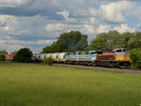 CP 7016 South finally approaching Alliston back on the move after a couple hours in the siding at Baxter for 113 and 421, with a heavy add to plan train 420 out of Sudbury for Toronto under some dramatic rolling clouds that opened up just in time! 