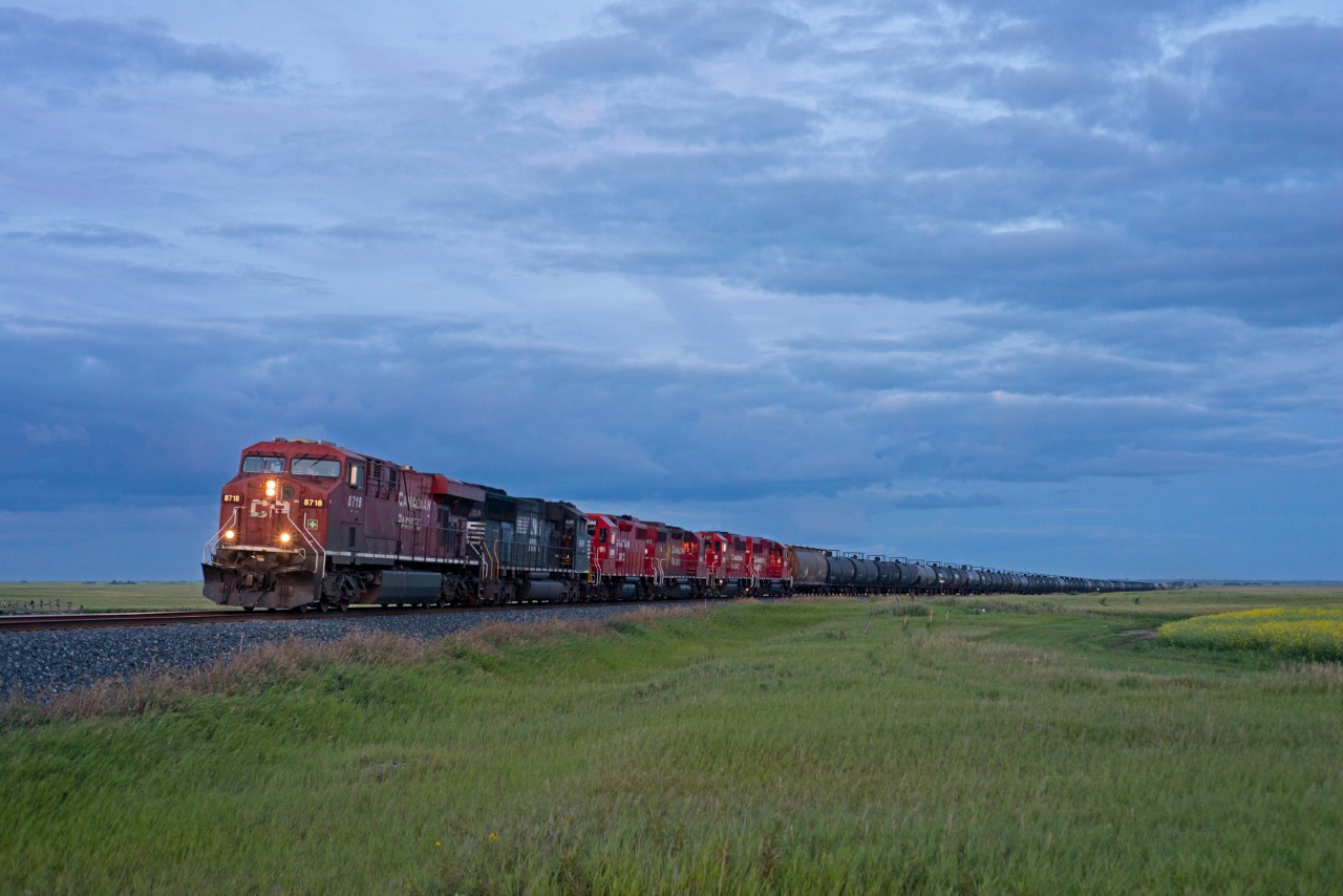 CP 467 makes it's way into Wilkie Saskatchewan for a crew change at dusk.  Up front are 8718,NS 6955,3096,3043,2317,2286 with NS 4021 as the tail end DP.