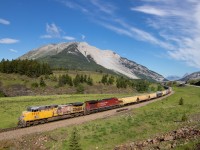 When I go out train watching, I like to make a full day of it. This day I got up at 5am, out the door for the 2 hour or so drive down to Crowsnest Pass area. Made it to this location where I caught this eastbound with Turtle mountain and Frank Slide as a nice backdrop. This was around 9am, thinking that wow this might be a good day. Train even had a BNSF pusher on the end. The next train that would come through did so at 6pm. Thankfully I am a very patient person. Made it home at 10:30pm, 3 trains the whole day. Still enjoyed my day down there.  