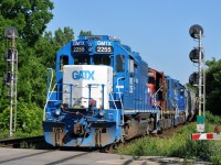 L58031 30 gives the stalled 397 a shove out of town. Full 397/580 consist was CN 3178, GECX 2038, 181 cars, GMTX 2277, CN 7029, and GMTX 2255