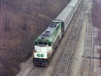 An old image from when I spent a few chancy days up in the abandoned Canada Crushed Stone conveyor overhang at Dundas, mile 4. This shows GO 504 leading a scheduled passenger, perhaps should have had a Tempo unit on it, I forget. In the background is the Sydenham Rd bridge.
This GP 40TC loco was sold off to Amtrak in 1988 and became their #196.