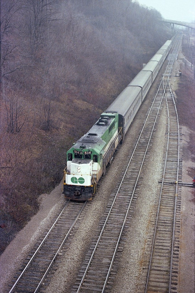 An old image from when I spent a few chancy days up in the abandoned Canada Crushed Stone conveyor overhang at Dundas, mile 4. This shows GO 504 leading a scheduled passenger, perhaps should have had a Tempo unit on it, I forget.  In the background is the Sydenham Rd bridge.
This GP 40TC loco was sold off to Amtrak in 1988 and became their #196.