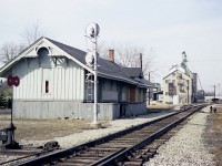Here is another one of those nondescript stations from the deep Ontario Southwest.
Back in the 1880s, Hiram Walker of Walkerville (Windsor) undertook the building of a railroad to Harrow, (and later to Leamington) in which the transportation of grains for his distillery. This proved to be a real boon as the town grew raipdly; and all kinds of agricultural products took advantage of going to market via the railway rather than get stuck in the muddy roads of the day. The line, known as the Lake Erie, Essex and Detroit; with Essex later being dropped, was in 1904 sold to Pere marquette, which eventually became part of the C&O Canada division.
The last train thru Harrow was in late 1991, and the track taken up soon after. Station is long gone.