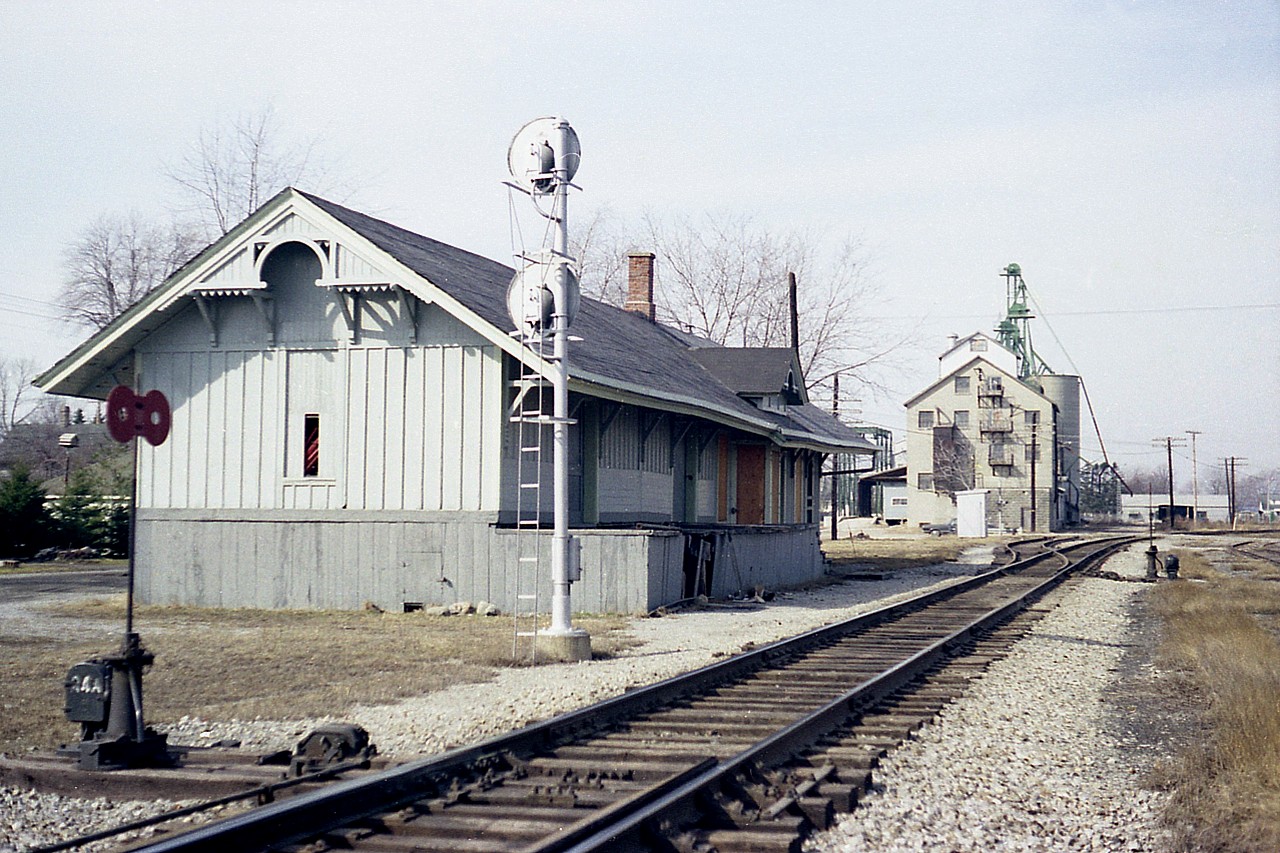 Here is another one of those nondescript stations from the deep Ontario Southwest.
Back in the 1880s, Hiram Walker of Walkerville (Windsor) undertook the building of a railroad to Harrow, (and later to Leamington) in which the transportation of grains for his distillery. This proved to be a real boon as the town grew raipdly; and all kinds of agricultural products took advantage of going to market via the railway rather than get stuck in the muddy roads of the day. The line, known as the Lake Erie, Essex and Detroit; with Essex later being dropped, was in 1904 sold to Pere marquette, which eventually became part of the C&O Canada division.
The last train thru Harrow was in late 1991, and the track taken up soon after. Station is long gone.