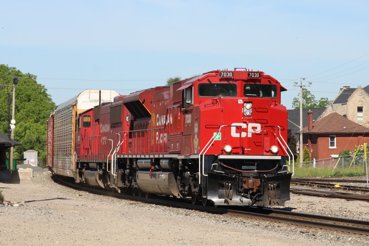 CP 234 flies through Galt on a hot June morning with a nice combo of units leading (6260 is trailing behind).