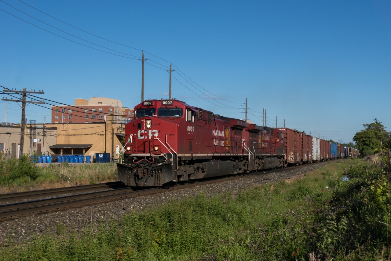 8007 leads a 109 car 147 westward by mile 21 Galt Sub.