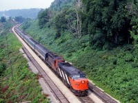 VIA 6777 is in charge of Sarnia-Toronto train 84 at mile 4.4 on the CN's Dundas Sub. The elevated view was from Canada Crushed Stone's overhead conveyor that crossed the CN main.