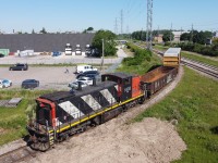 CN 1408 sits on a leg of a wye in Guelph while the crew goes off to work other industries with the GMTX 2163.  