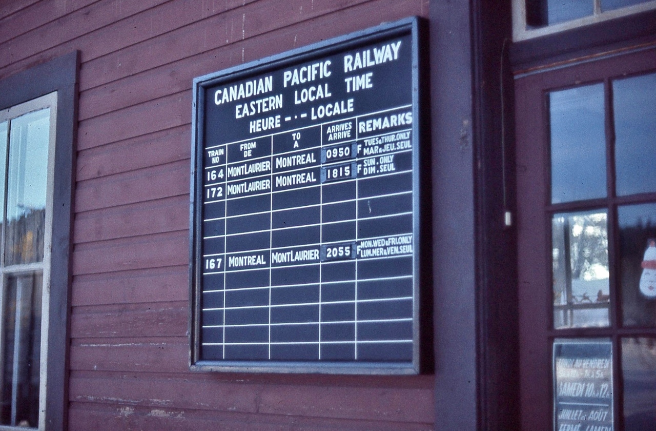 …..an era long gone ..... 


  ( analogue ) Public passenger train schedule board, CP Rail St. Jovite, P.Q., 


   les heures: juillet & aout, ferme lundi


  Mile 65.0 Ste. Agathe Subdivision, December 1976  Ektachrome by S. Danko 


  Le Gare    


 sdfourty
