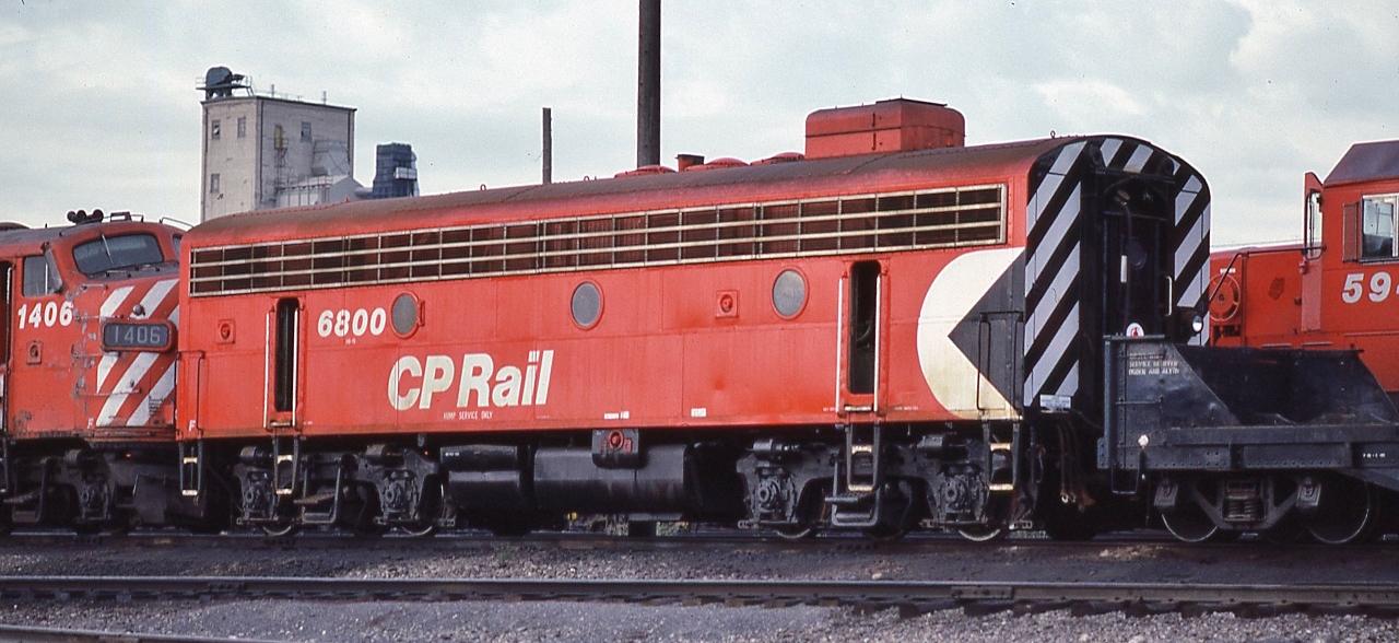 'Hump Service Only ' CP Rail #6800 ,  rebuilt from #4445 (GMD F7B 1952)  in 1983


  renumbered #1018 in 1996, sold to National Railway Equipment June 1999


….to the left FP9-A  #1406 ( GMD 1954), hopefully not in 'hump service only'....


 to the right SD40-2 #5942


 …..the eighties: the MultiMark was everywhere...


 At  CP Rail Alyth, September 1983 Kodachrome by John Baker, collection of Steve Danko