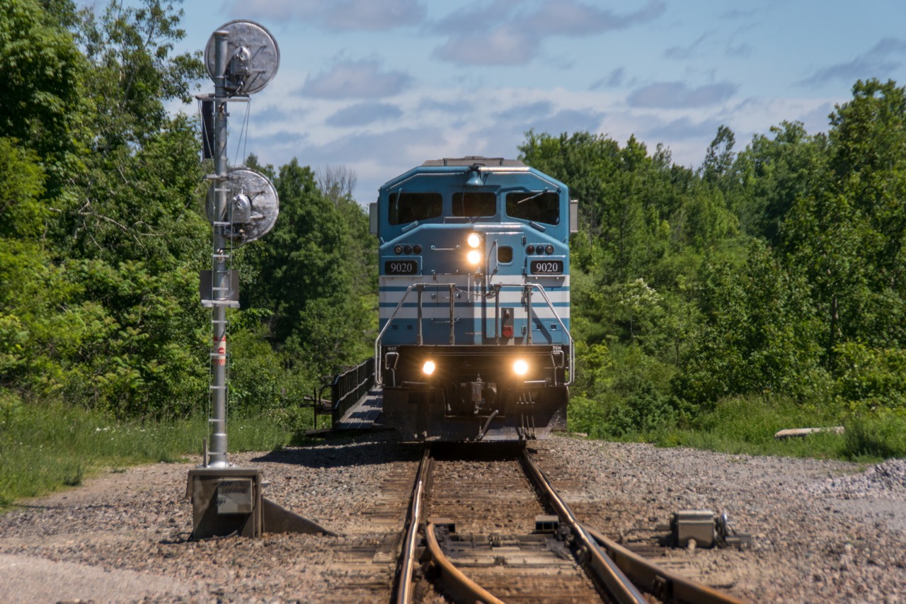 As seen from the Dixie Road crossing, 143 has stopped to wait for space to open up ahead. Due to closely following CP 113 which was stopped at Toronto Yard, this was the last location where the 9000'-plus CMQ-led 143 would fit without blocking crossings.