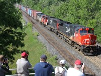 A CN eastbound (most likely 422) greets a photo lineup of railfanners on the lower tier of the Laking Garden bridge at the infamous Bayview Jct. during the annual Bayview meeting in June 2015. Due to the Covid-19 pandemic I don't think there was a Bayview meeting this year, but if it happens in 2021, it is a great opportunity to meet fellow railfanners in person, and shoot trains, even if they just have GEVOs on them :) Power on this train was CN 2600-CN 5620-CN 2402. 