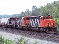 In its time, the hottest train on the railroad, 201 has zipped across through Algonquin Park, Brent, and North Bay beginning its 4 day trek to Vancouver. The early 90's had the best lashups; here an SD40-2W, and 2 SD40's, but the GM and GE cowls were on the property...as were the MLW's running out there last miles. No DPU's, no 12000 foot trains and none..or very little of the over siding length nonsense that paralyses today's operations. It was the best of times....