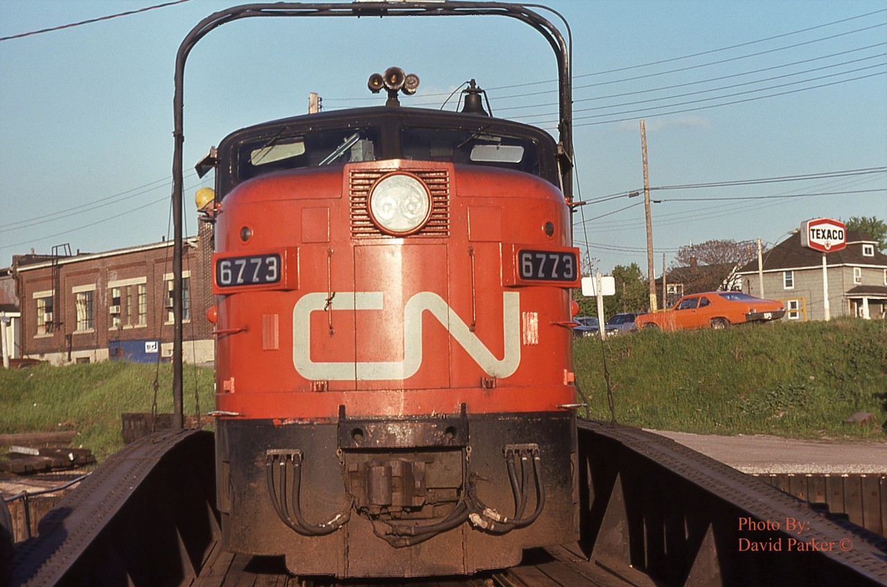 CN 6773 takes a spin on the turntable down on the riverfront in Windsor, Ont.
I was only 15 when I shot this. Back in the days when you could get up close, when you would get a wave to come up in the cab and maybe even get a ride through the yard, and if extremely lucky, get to blow the horn.