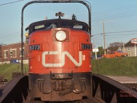  CN 6773 takes a spin on the turntable down on the riverfront in Windsor, Ont.
I was only 15 when I shot this. Back in the days when you could get up close, when you would get a wave to come up in the cab and maybe even get a ride through the yard, and if extremely lucky, get to blow the horn.   