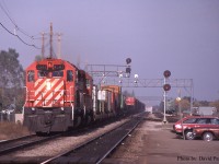  The CP Eastbound "Starlite" hustles through Burlington on the CN Oakville Sub behind SD40's 5547 & 5506 on Oct 14th 1981. 