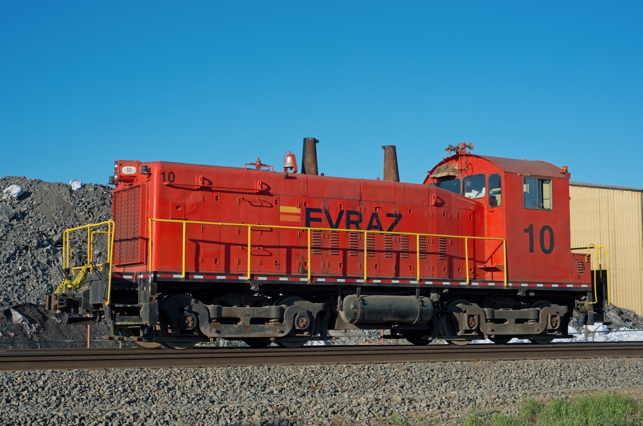 Western Canada's largest steel producer, Evraz has small fleet of switchers at it's facility in the north end of Regina SK. #10 is the cleanest one I've seen yet. It is seen here having just passed over the public crossing at grade at Pasqua Street. According to the CTG it was built for the Aliquippa & Southern Railroad in 1956.