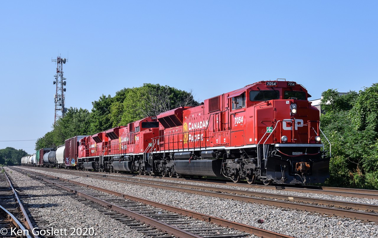 Returning from a trip down the D&H, a trio of new SD70ACu units rolls toward Montreal's St Luc yard.