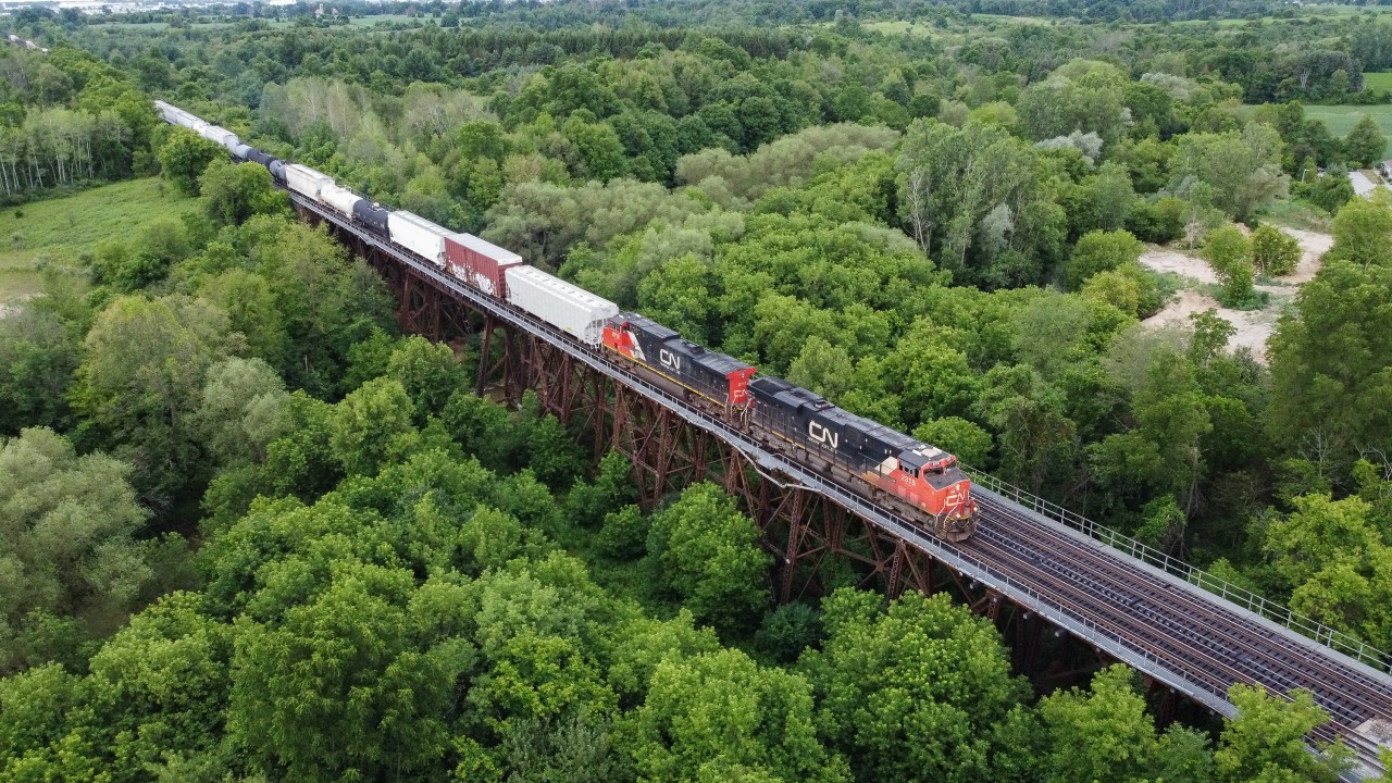 CN 396 blasts over the Fairchilds Creek Bridge with CN 2315 and IC 2712.  This trestle is rarely seen or photographed because of being very overgrown and not being overly accessible.  Today the Mavic Mini came in handy and provided the elevation needed to view the bridge which is much larger than I originally thought.