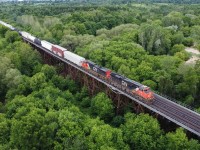 CN 396 blasts over the Fairchilds Creek Bridge with CN 2315 and IC 2712.  This trestle is rarely seen or photographed because of being very overgrown and not being overly accessible.  Today the Mavic Mini came in handy and provided the elevation needed to view the bridge which is much larger than I originally thought.   