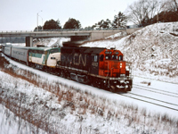 As this is posted, we are in the midst of a heat wave in southern Ontario...so let's try to "cool things off" with a "cool shot" from January 1977. This morning's train from Windsor has an interesting consist--CN GP40 4017 (geared for passenger service), borrowed GO Transit APCU (auxiliary power control unit) 901, and Tempo coaches! Renumbered to 9317, the GP40 was used in VIA passenger service into the mid-1980s, the ACPU units--many rebuilt from Ontario Northland FP7s--were in GO service into the mid-1990s, and most of the Tempo cars were retired by VIA and sold in 1987 (a few hung on into 1990).