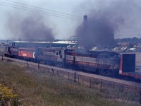 And while not a shot of the excursion, Bob will probably like this shot of the 4081 heading out of town. (Sorry, I don't have any records of the shot...southbound to Lethbridge and the Crowsnest Pass line?) Power from rear to front is CPA-16-4 4081, H-16-44 8605, F7B 4441, and an unidentified GP9.