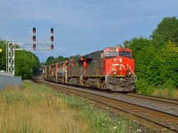 A nice surprise this morning, CN extra 382 nears it's final destination of Mac Yard passing through Georgetown at 0836h with 642 axles, plus a colourful assortment of 5 GE Dash 8-40CMs for K&K Recycling in Pickering.