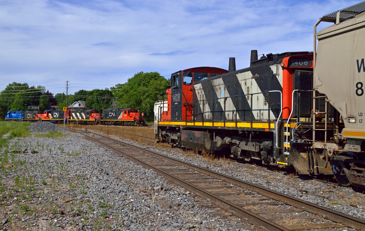 CN 1408 rests on the tail of L542 in XV1 while L568 shoves towards XV wye headed for the Guelph Sub.  Once on the main they will depart light power for Kitchener.