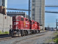 CP 3030 and 4434 finished their work before I could catch them servicing Canada Malters, still made for a wonderful shot passing the plant. 