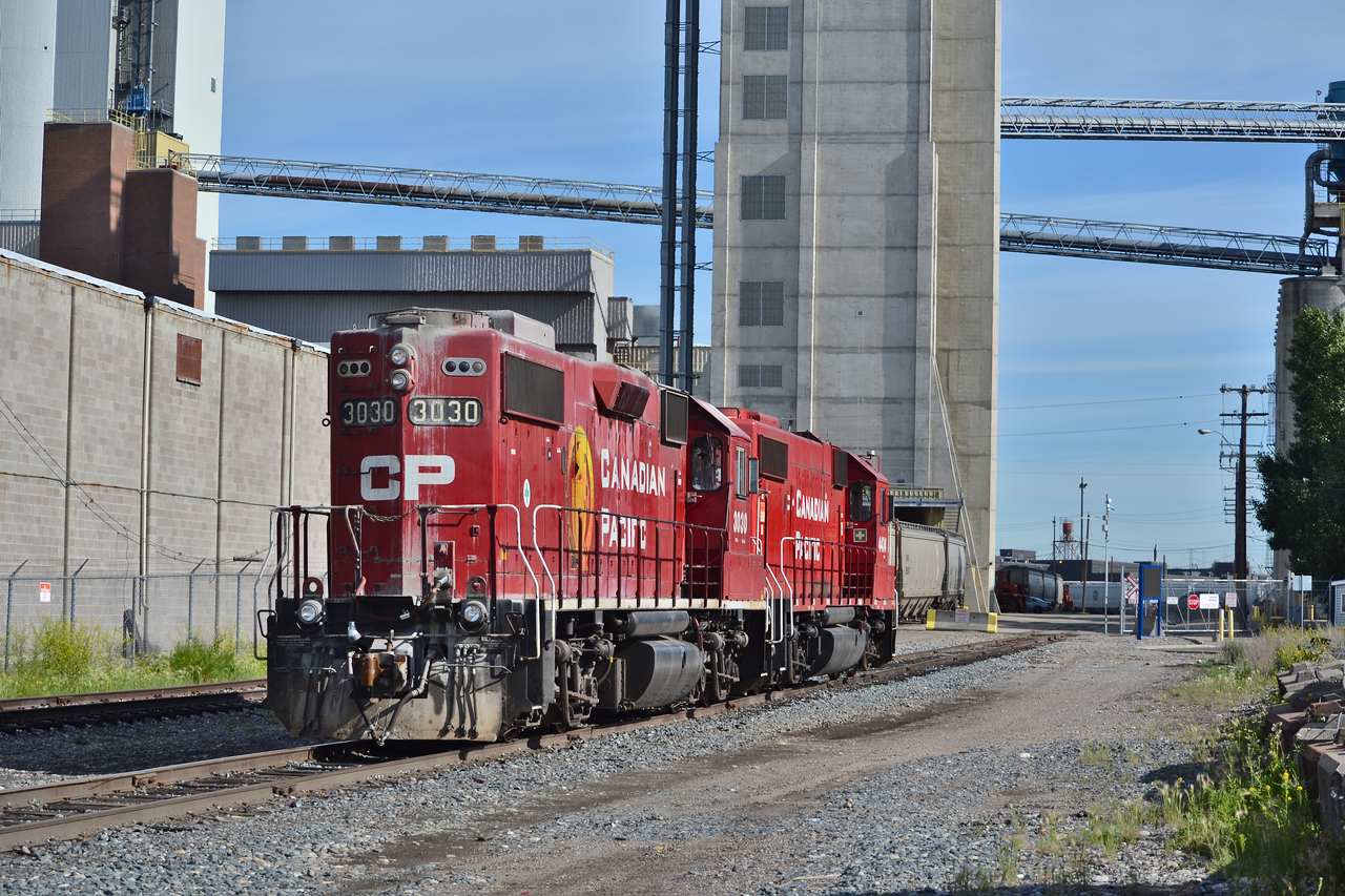 CP 3030 and 4434 finished their work before I could catch them servicing Canada Malters, still made for a wonderful shot passing the plant.