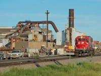 CP 6300 is seen passing the Evraz steel mill in the north end of Regina Saskatchewan. The 6300 is on its way to assist a southbound loaded potash train at Craven. There seems to be a small group of SD60s in captive service between Regina and Craven frequently referred to by the RTCs as "pushers", although I've yet to see one added anywhere but the headend. 
