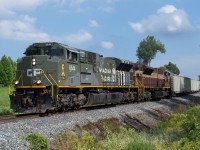 CP 6644 and CP 7016 lead train 247 towards Concession 7 in Waterdown amid what seemed to be one of the few sunny spots of the afternoon.