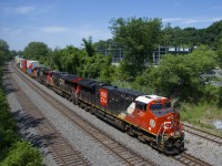 CN 120 with CN 3221, CN 3115 and CN 2957 is heading for Halifax after working Taschereau Yard.