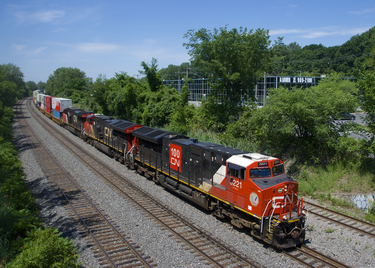 CN 120 with CN 3221, CN 3115 and CN 2957 is heading for Halifax after working Taschereau Yard.