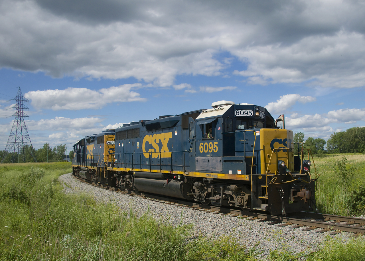 After having left the Transflo facility in Beauharnois, CSXT B786 is heading light power to pick up their train before heading towards Cecile Junction and interchange with the CN first. Power is CSXT 6095 & CSXT 2622.