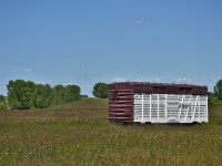 Well this is a first, driving to Aldersyde in hopes to catch a local wound up with zero results. Driving back along A2, noticing this lone ex Canadian Pacific cattle car in a field. Wound up that a local resident had restored an old Canadian Pacific station and buildings from the Southern Alberta area. An exert from the Okotok's website states 

"Champion Park was gifted by the Knowlton Family. Gerald L. Knowlton built the park as an homage to the CPR and as a family tribute to his mother, Faye, and father, Frederick (Ted) Knowlton – a CPR station agent who served in the town of Standard, Alberta for 42 years. The park was replicated after the train station and surroundings that his father operated.

Founded in 1979, Champion Park includes not only the land, but a lake, a restored CPR railway station from Champion, Alberta, a number of outbuildings, railway tracks, a 1960s era locomotive, a 1948 mail-express car, a 1929 Executive car (“The Saskatchewan”), display and rail cars, rolling stock as well as other period equipment and railway artifacts. The park is located 5 km northeast of Okotoks and 7 km north of Aldersyde on the east side of Highway 2 at the junction of 64 St. East and Township Road 210.

Its always a treat finding small hidden gems like this.
